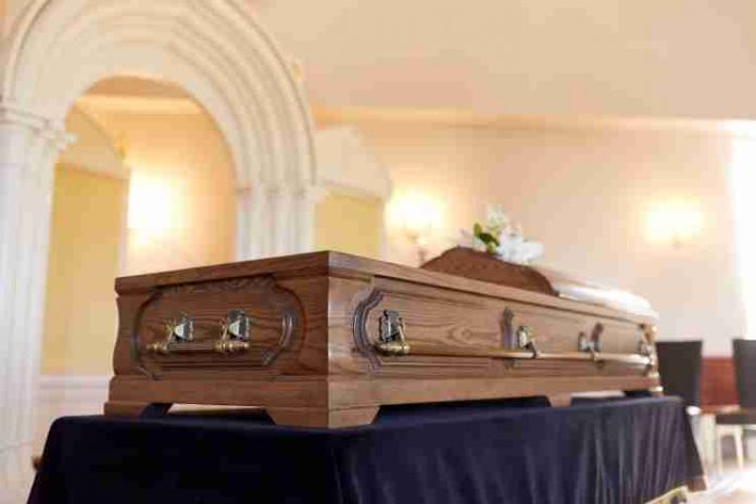funeral and mourning concept - coffin at orthodox church