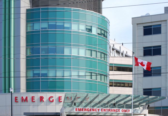 Section of a new hospital, flying a Canadian flag