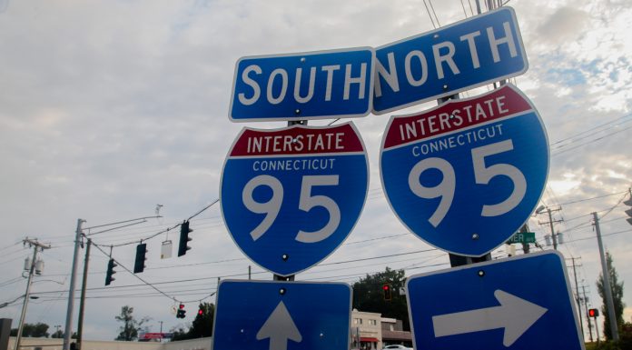 Norwalk, CT, USA - September 5, 2021: Interstate 95 road sign on Post road or Connecticut Avenue at morning